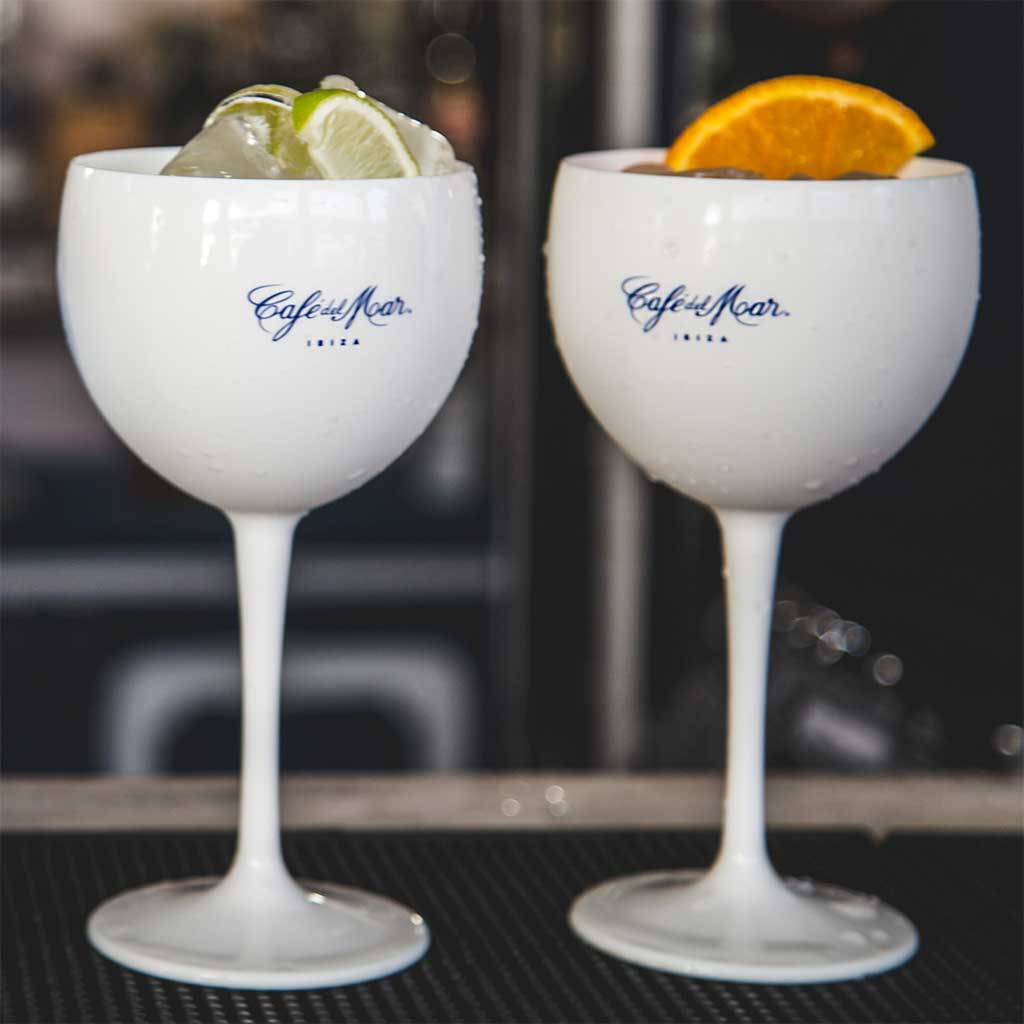 Two Café del Mar ballon glasses containing cocktails